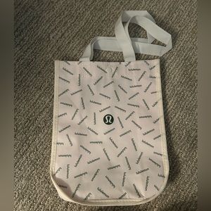 White lululemon bags. $5 per bag.